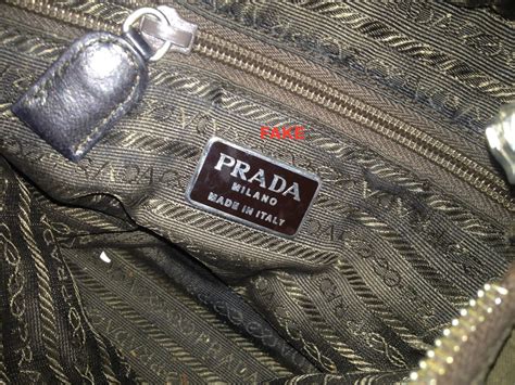 real or fake prada wallet|real prada purse.